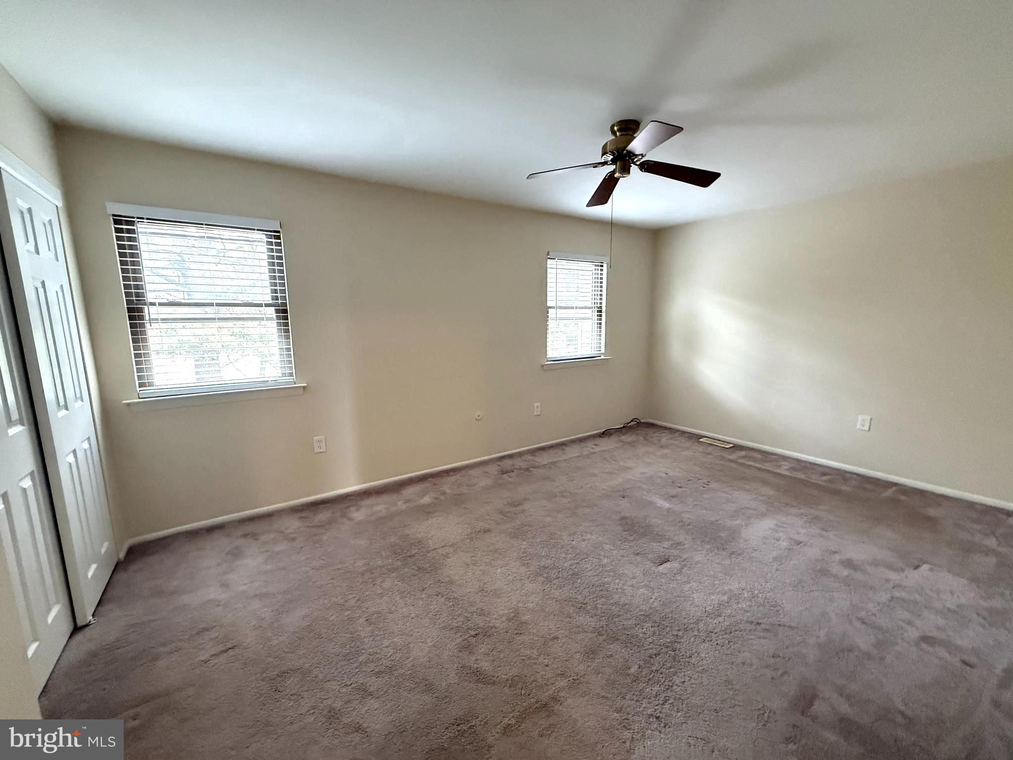 261 Bishop Drive Aston, PA 19014 - Photo 26 of 36 an empty room with a window and a fan