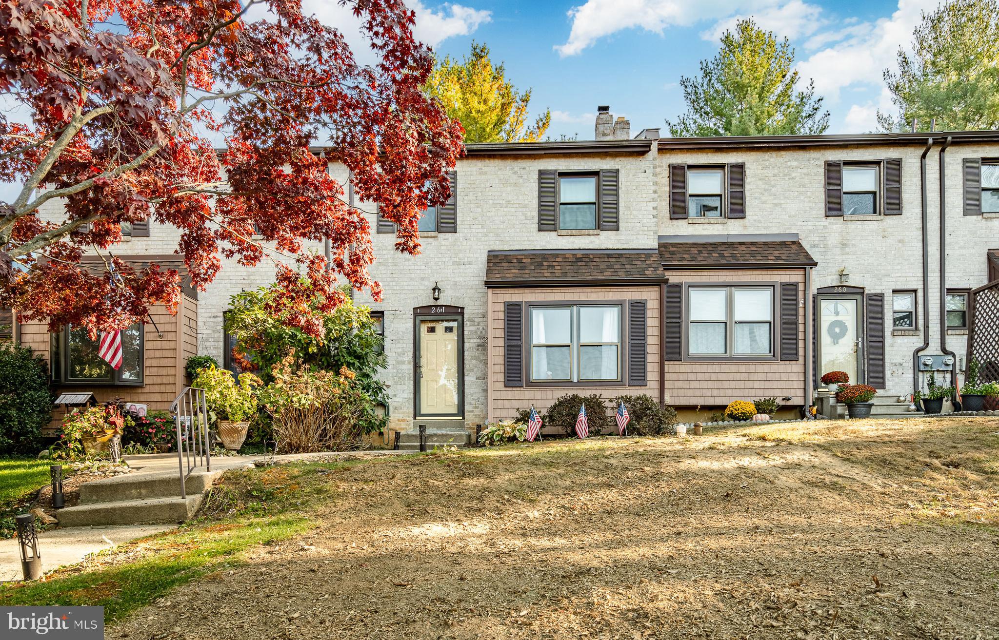 261 Bishop Drive Aston, PA 19014 - Photo 4 of 36 a front view of a house with a yard