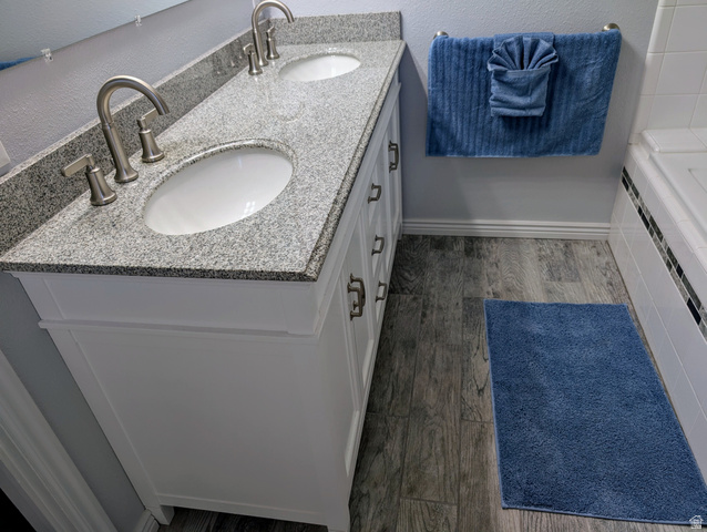897 East 1200 North Mapleton, UT 84664 - Photo 32 of 54 Full bathroom with double vanity, tiled bath