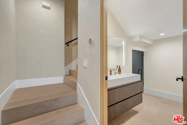 a view of a park with large trees