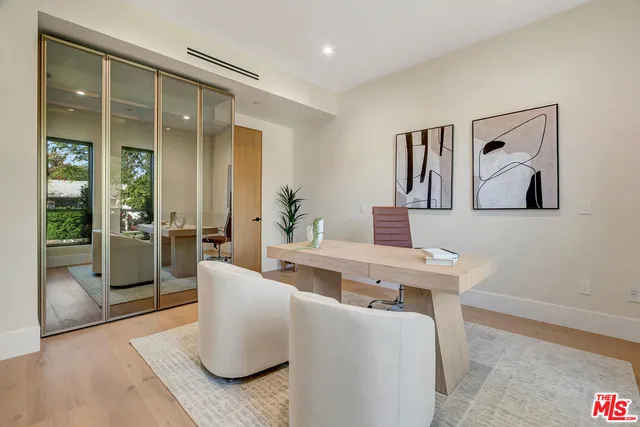 a bedroom with a bed and a view of bathroom