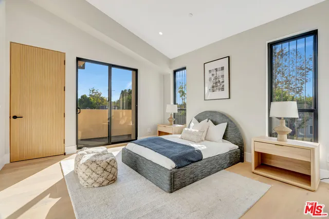 a view of staircase with white walls