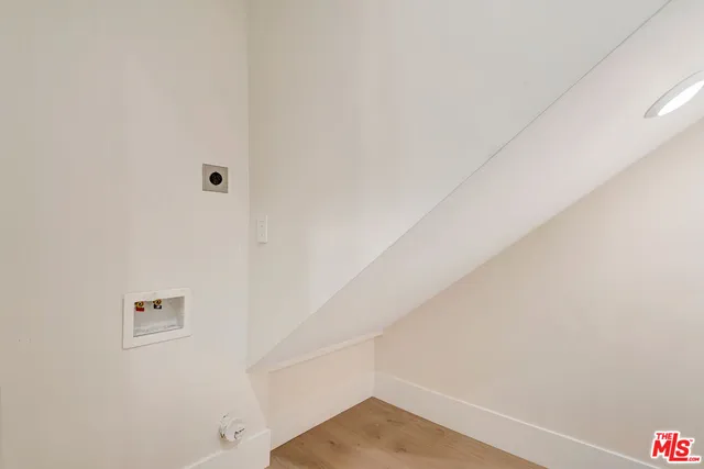a aerial view of a house with a yard and plants