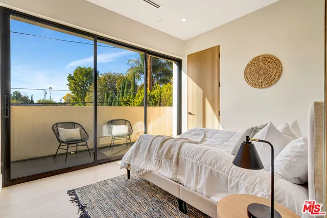 a picture of a bathroom with a shower