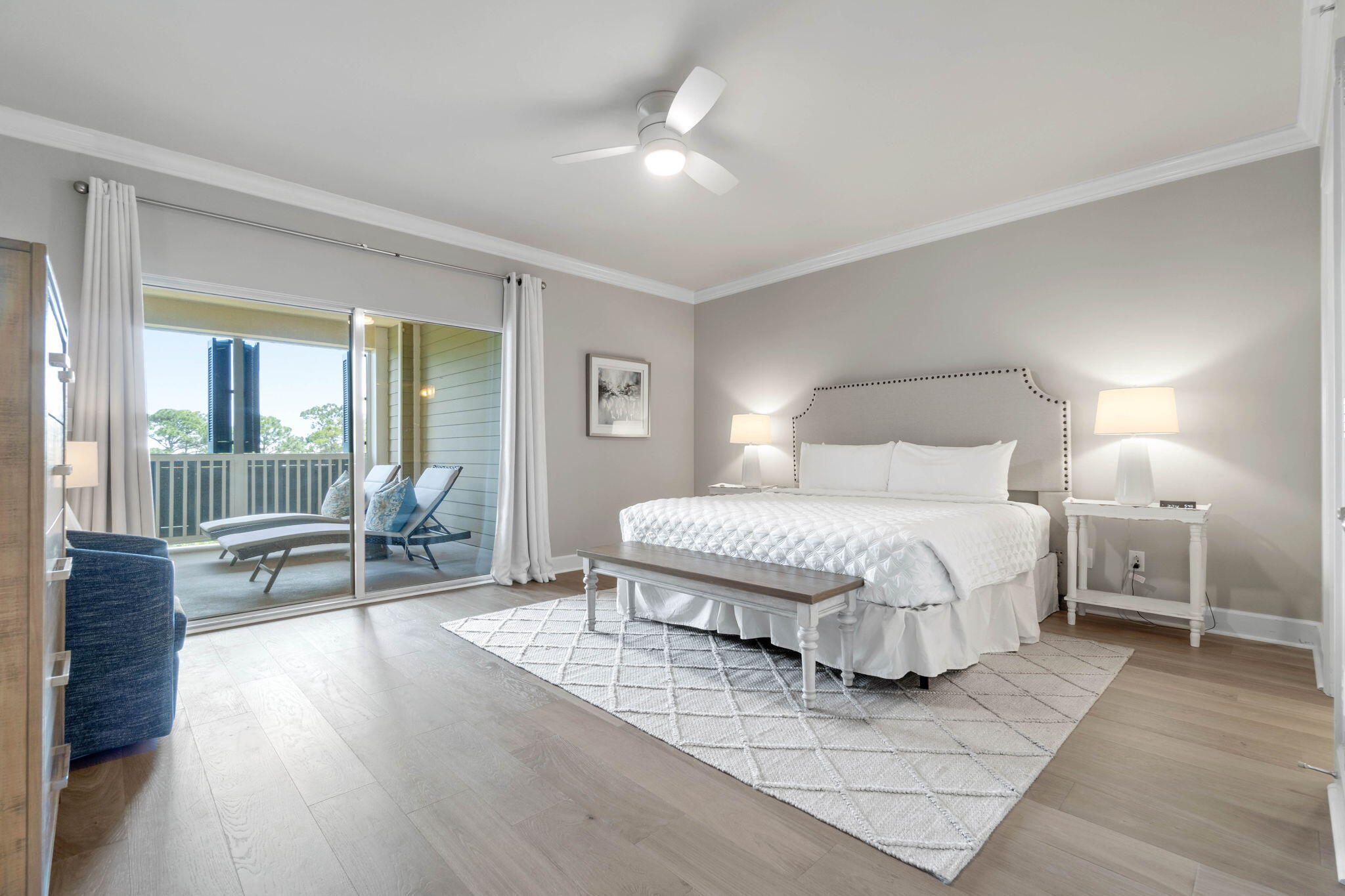 1732 West County Highway 30A, Unit 402 Santa Rosa Beach, FL 32459 - Photo 21 of 32 a bedroom with a bed and wooden floor