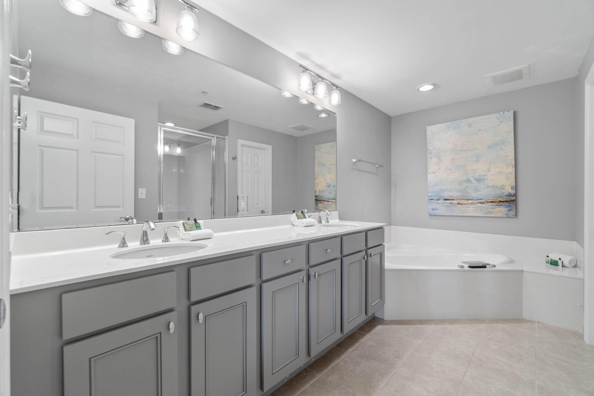 1732 West County Highway 30A, Unit 402 Santa Rosa Beach, FL 32459 - Photo 22 of 32 a bathroom with a tub a sink double and mirror