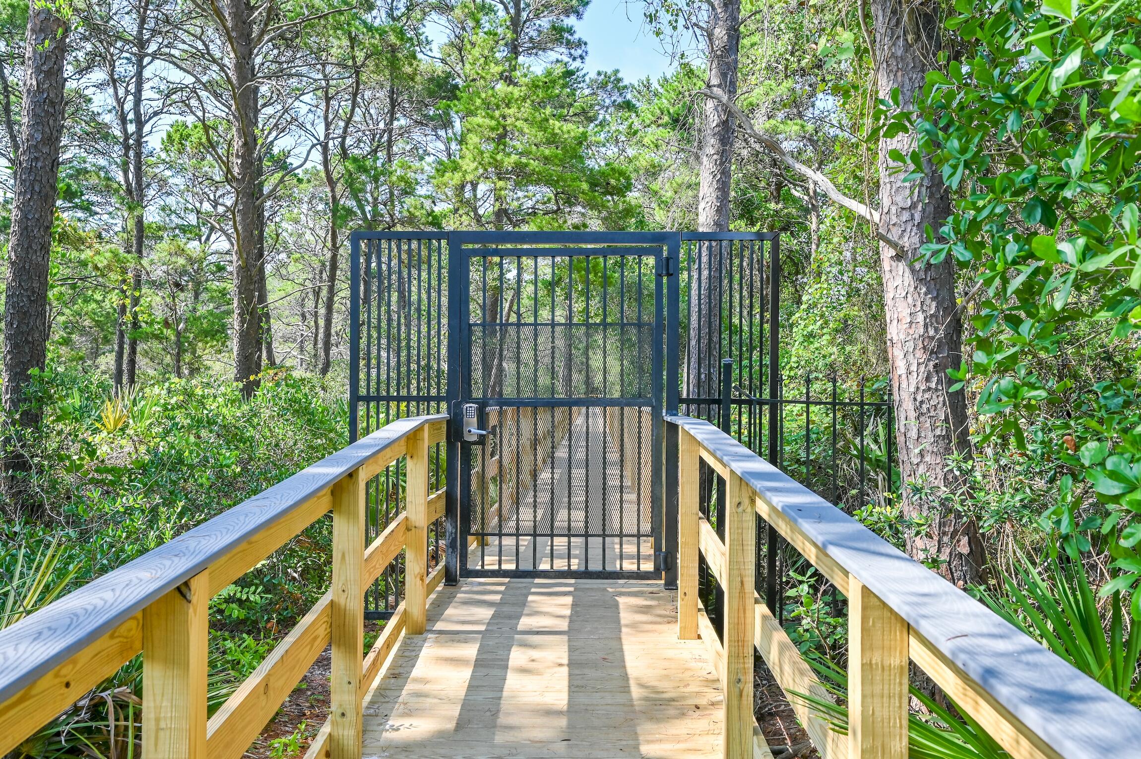1732 West County Highway 30A, Unit 402 Santa Rosa Beach, FL 32459 - Photo 5 of 32 a view of balcony with deck and trees
