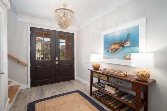 a bathroom with a sink toilet vanity and shower