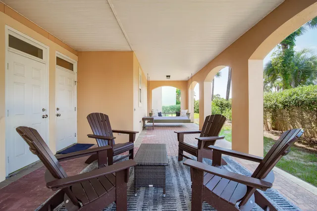 a bedroom with a bed and a lamp