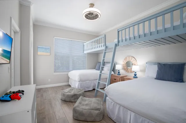 a view of a room that has a table and chair in it