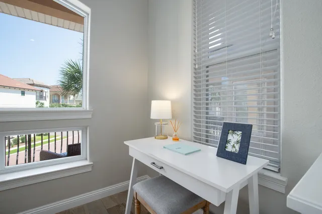a view of balcony with furniture
