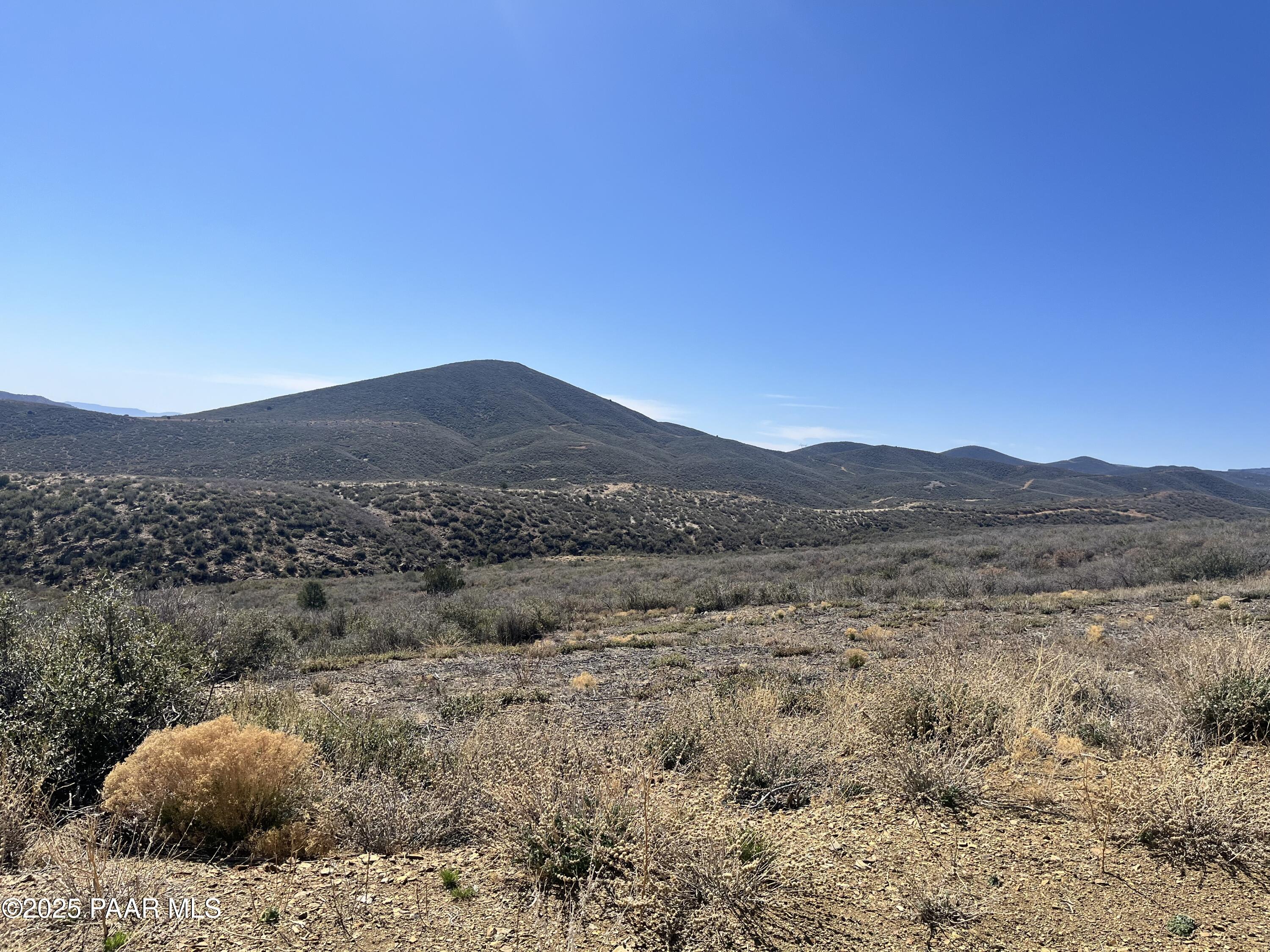a view of a mountain with a outdoor space