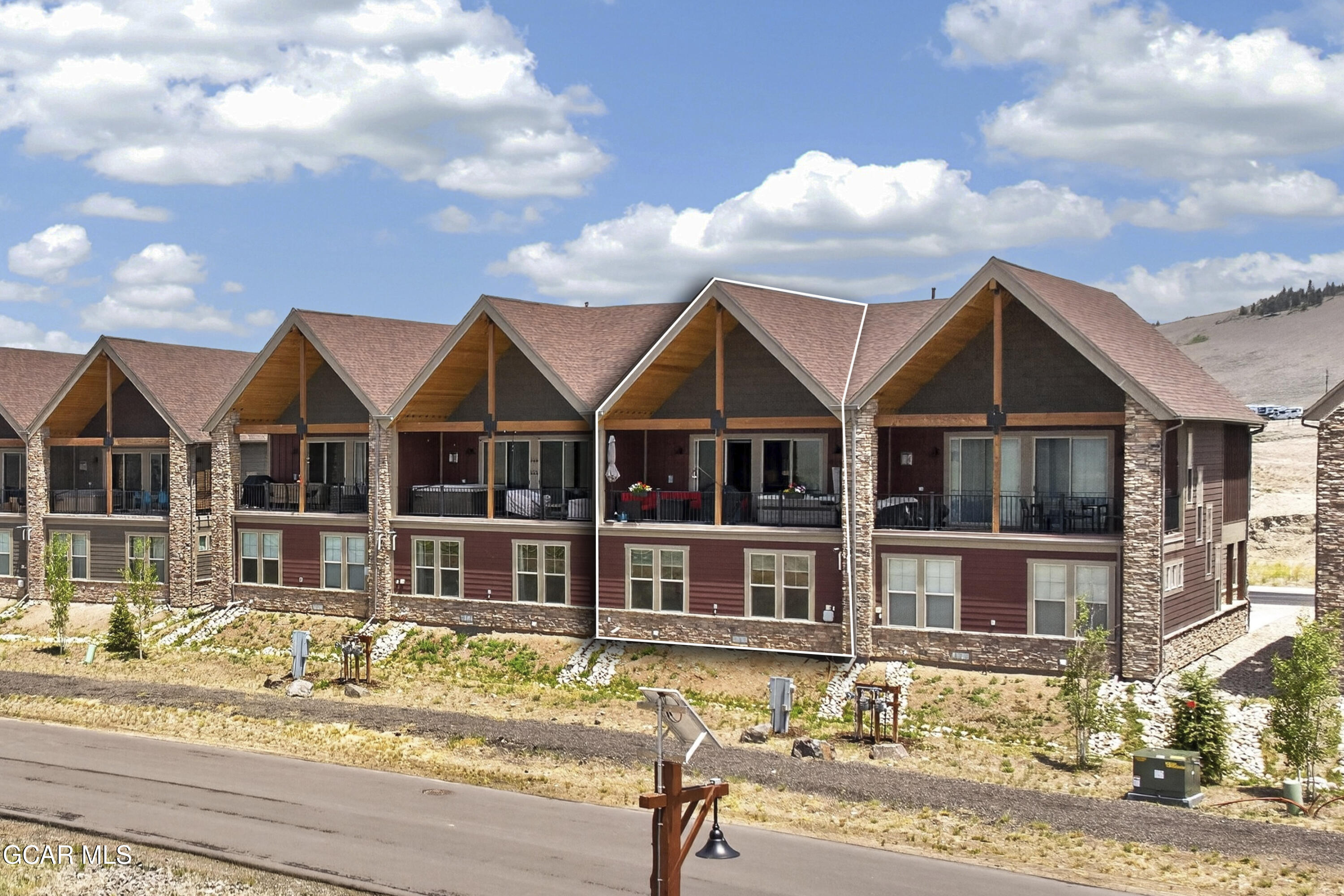 154 Eagle Ridge Drive Granby, CO 80446 - Photo 3 of 59 a front view of a house with a yard