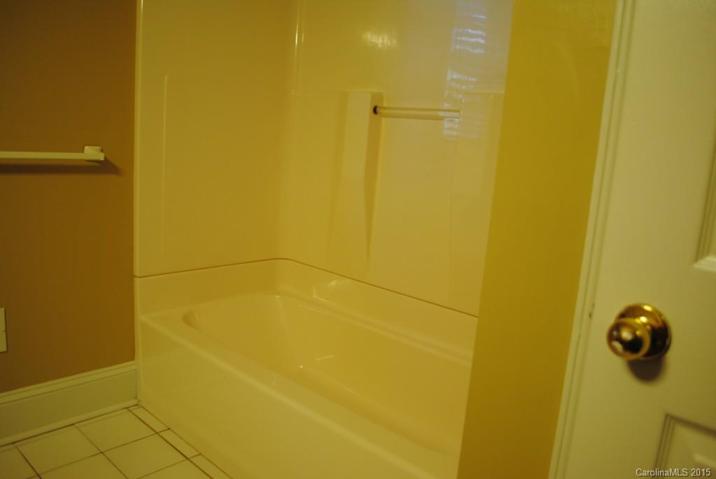 2057 Eaton Road Charlotte, NC 28205 - Photo 10 of 13 a bathroom with a shower