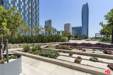 a view of a city with tall buildings
