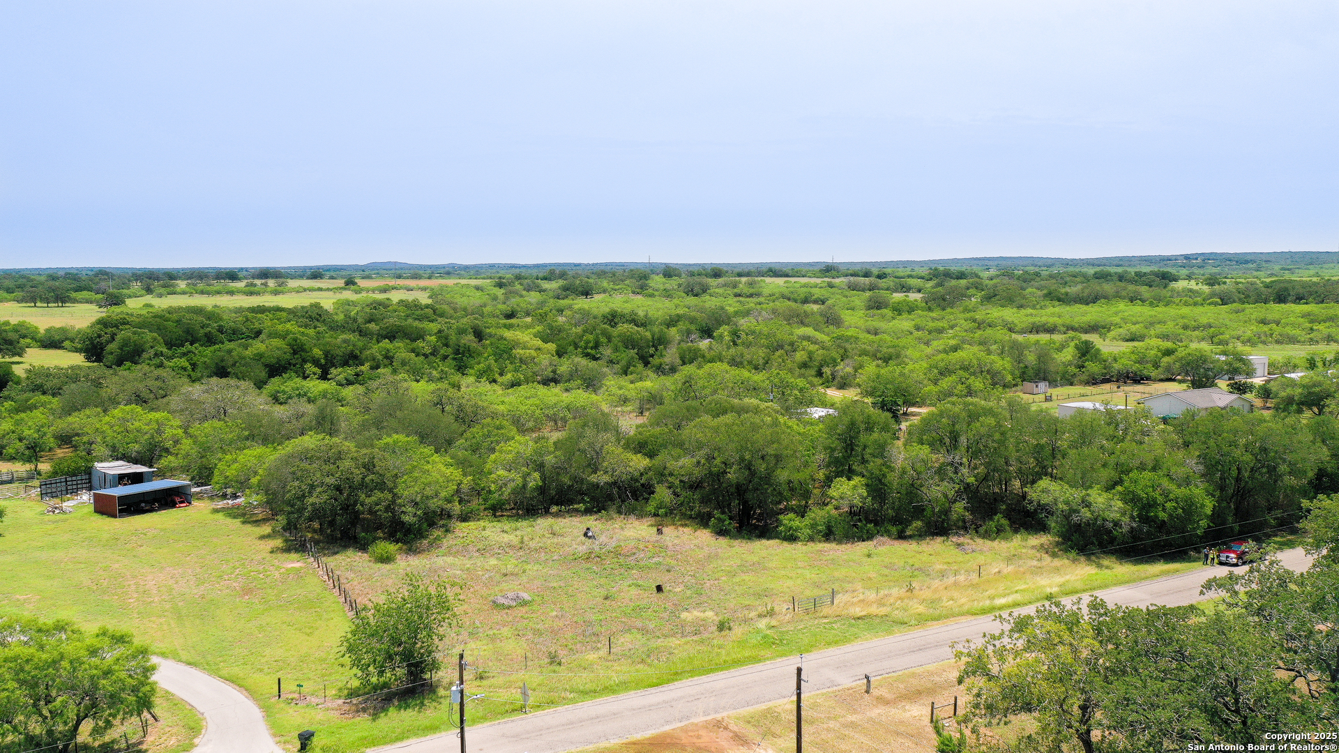 699 McKnight Road Seguin, TX 78155 - Photo 9 of 11 a view of a yard with an outdoor space