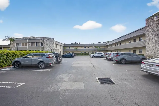 a view of cars parked in a parking lot