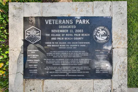 a sign that is on the side of a road