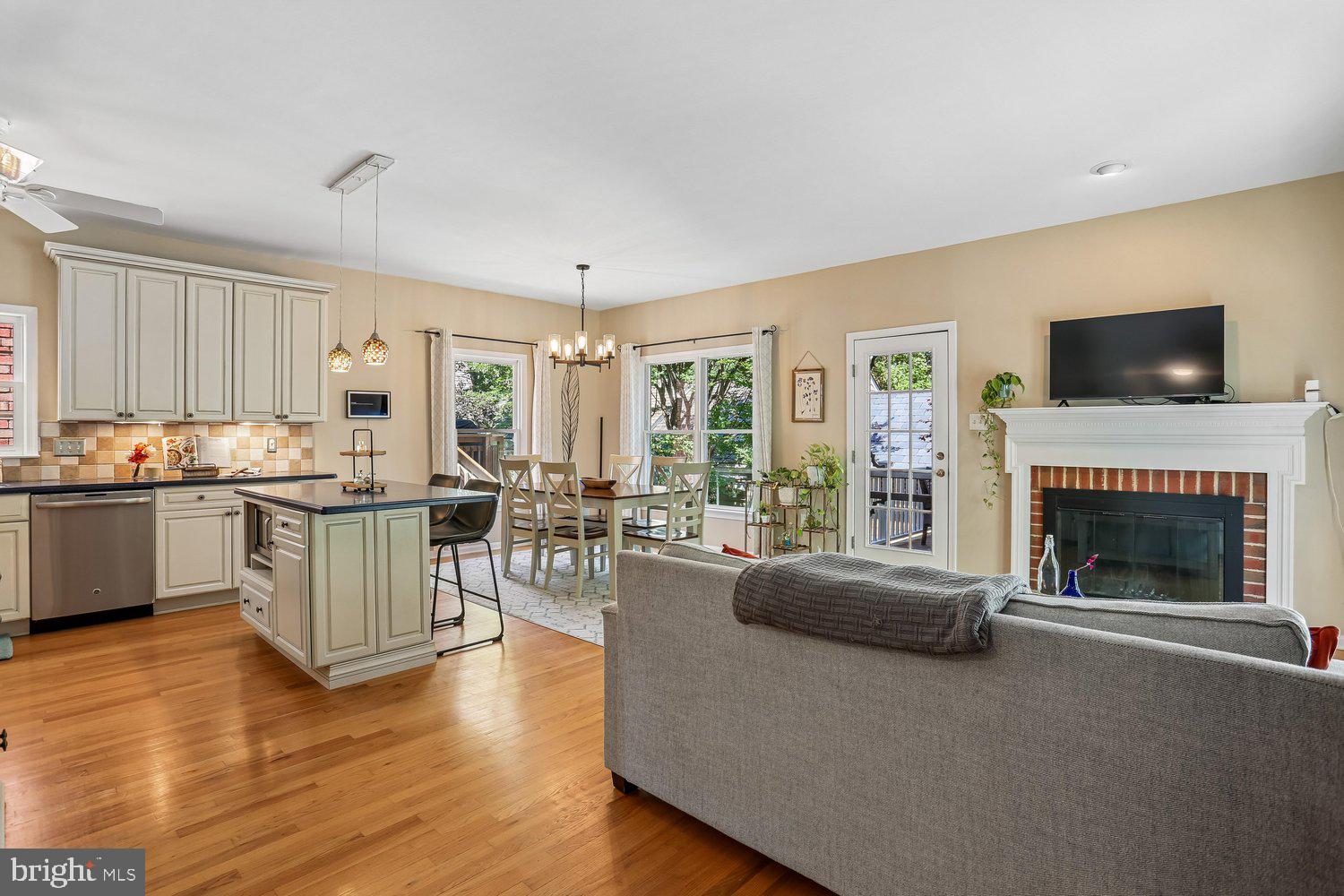 465 Tschiffely Square Road Gaithersburg, MD 20878 - Photo 21 of 74 Family room anchored by fireplace