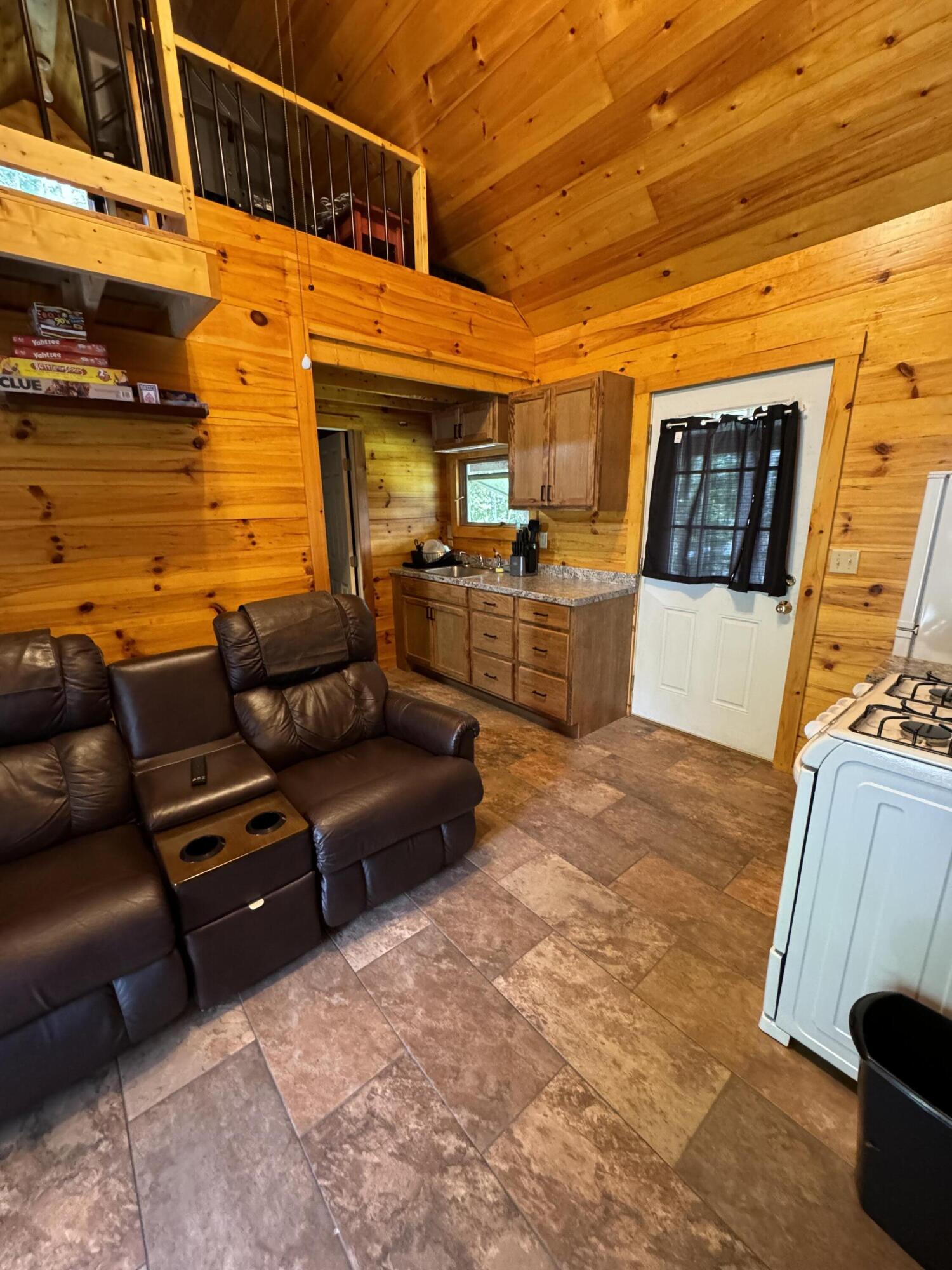18 Winter Drive Embden, ME 04958 - Photo 69 of 116 Guest Cabin Living Room