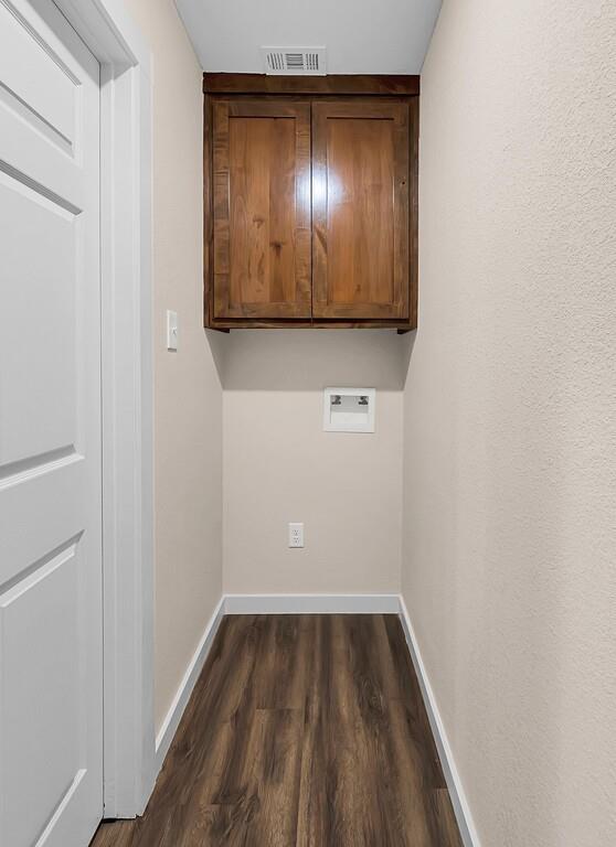210 North Harrison Street McGregor, TX 76657 - Photo 13 of 25 a view of a small space with wooden floor and staircase