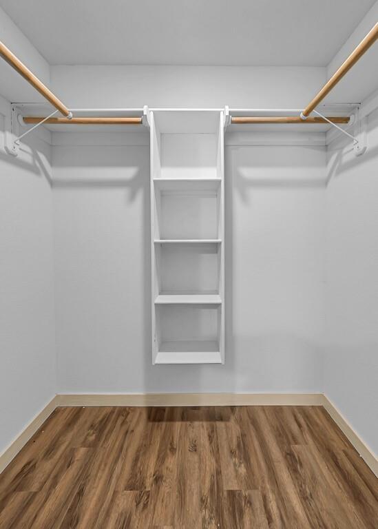 210 North Harrison Street McGregor, TX 76657 - Photo 16 of 25 a view of walk in closet with empty racks