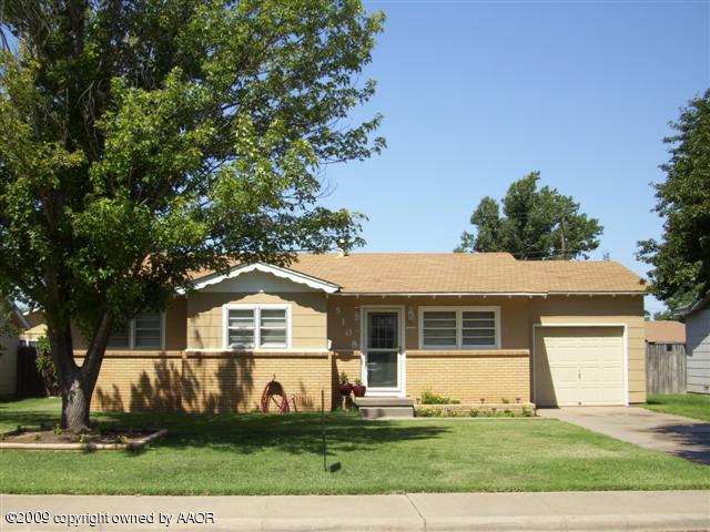 5108 South Bonham Street Amarillo, TX 79110 - Photo 1 of 13 a front view of a house with a yard