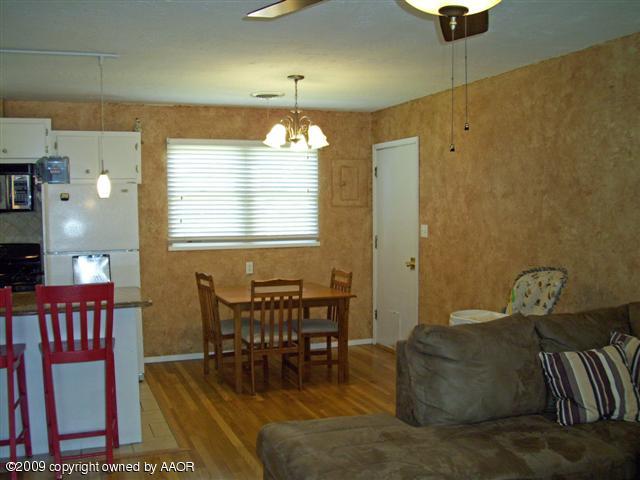 5108 South Bonham Street Amarillo, TX 79110 - Photo 3 of 13 a view of a dining room with furniture
