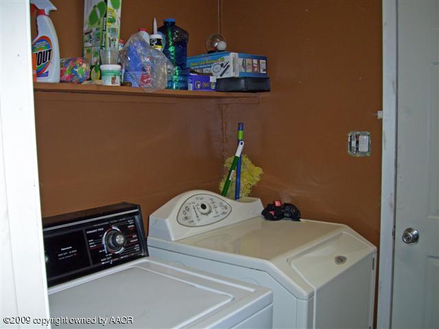 5108 South Bonham Street Amarillo, TX 79110 - Photo 10 of 13 a utility room with dryer and washer