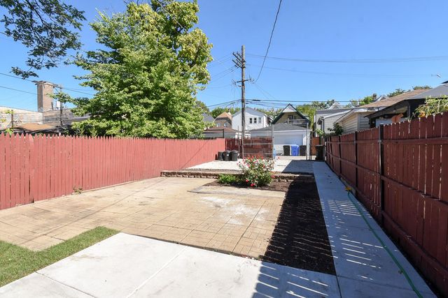 a view of a house with a street