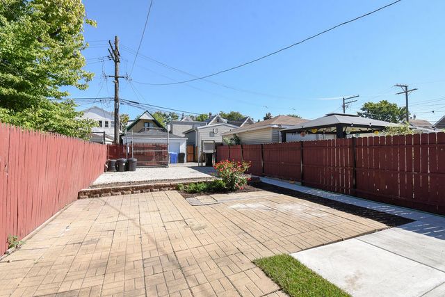 a view of a terrace with a bench