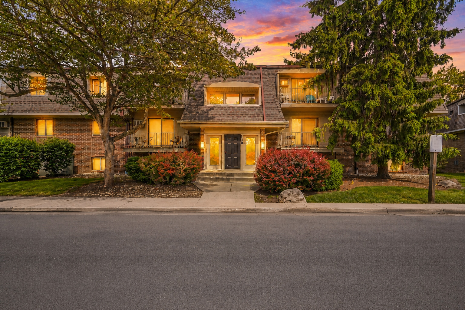 138 East Bailey Road, Unit M Naperville, IL 60565 - Photo 1 of 1 front view of house with a street