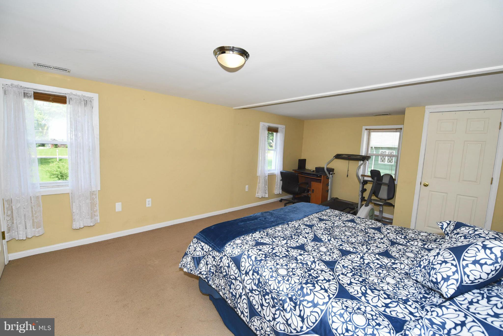 417 Reckord Road Fallston, MD 21047 - Photo 21 of 30 a bedroom with a bed and wooden floor