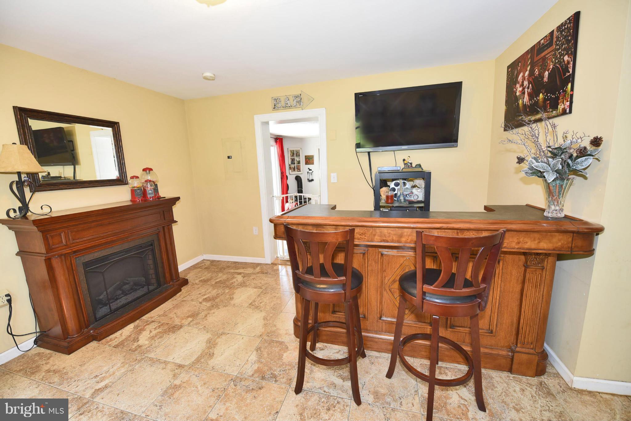 417 Reckord Road Fallston, MD 21047 - Photo 6 of 30 a dining room with furniture and a flat screen tv