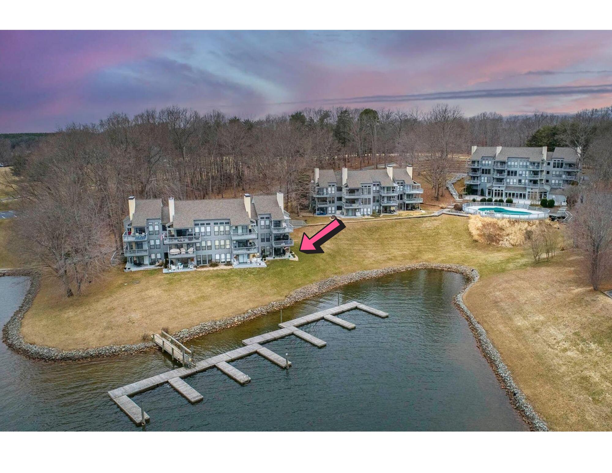 100 Dockside Circle, Unit 201 Moneta, VA 24121 - Photo 3 of 52 a room with a table and chairs