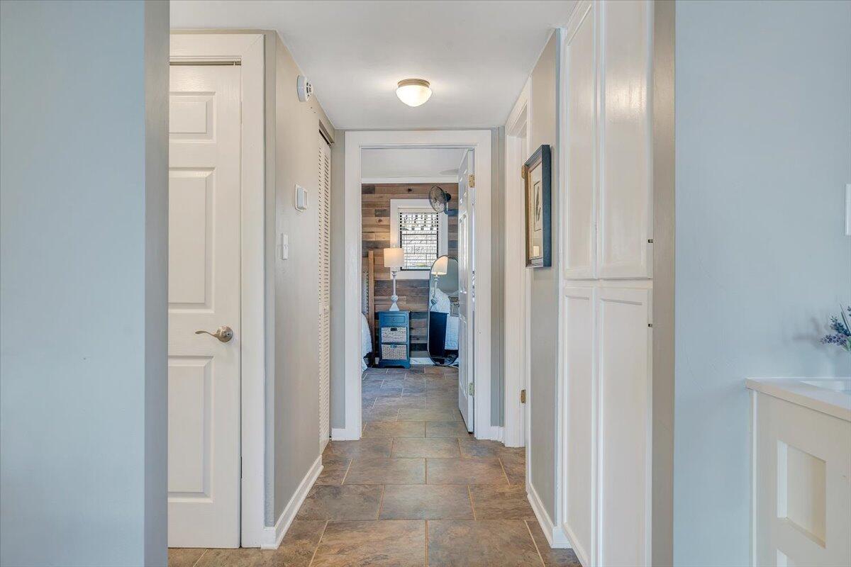 100 Dockside Circle, Unit 201 Moneta, VA 24121 - Photo 32 of 52 a view of a hallway with wooden shelves
