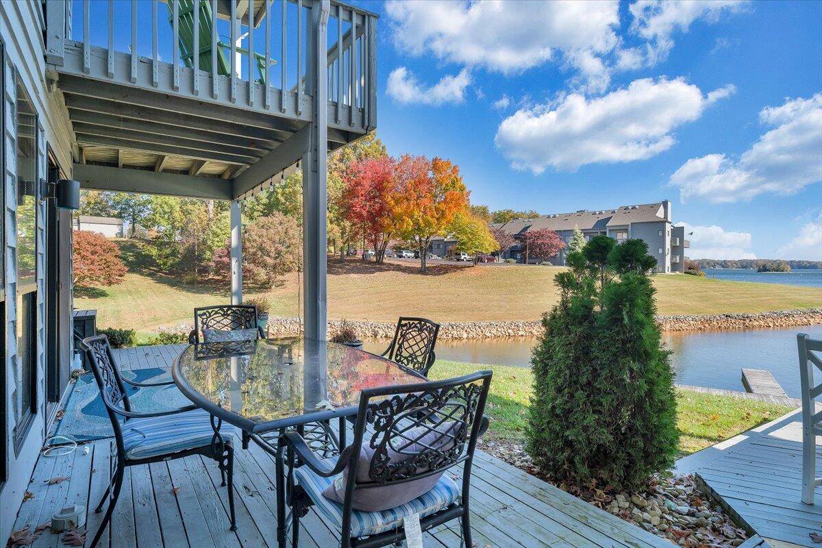 100 Dockside Circle, Unit 201 Moneta, VA 24121 - Photo 40 of 52 a view of a chairs and table in the balcony