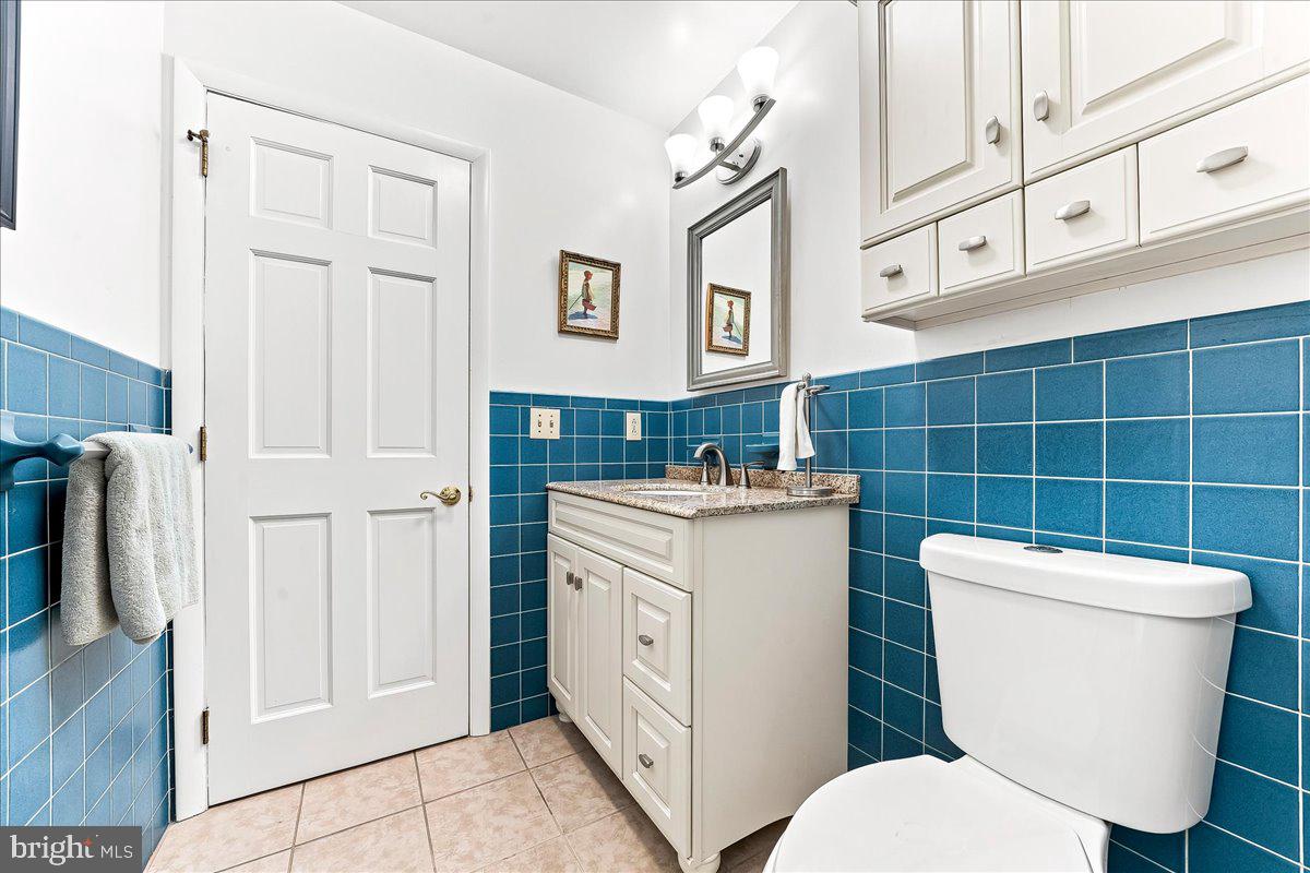 2765 Blue Ball Road Elkton, MD 21921 - Photo 27 of 54 Charming bathroom with vibrant tiles.