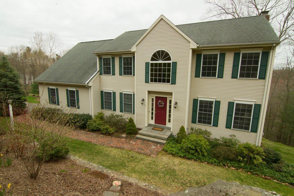 25 Manitook Mountain Road Avon, CT 06001 - Photo 1 of 1 a view of outdoor space yard and front view of a house