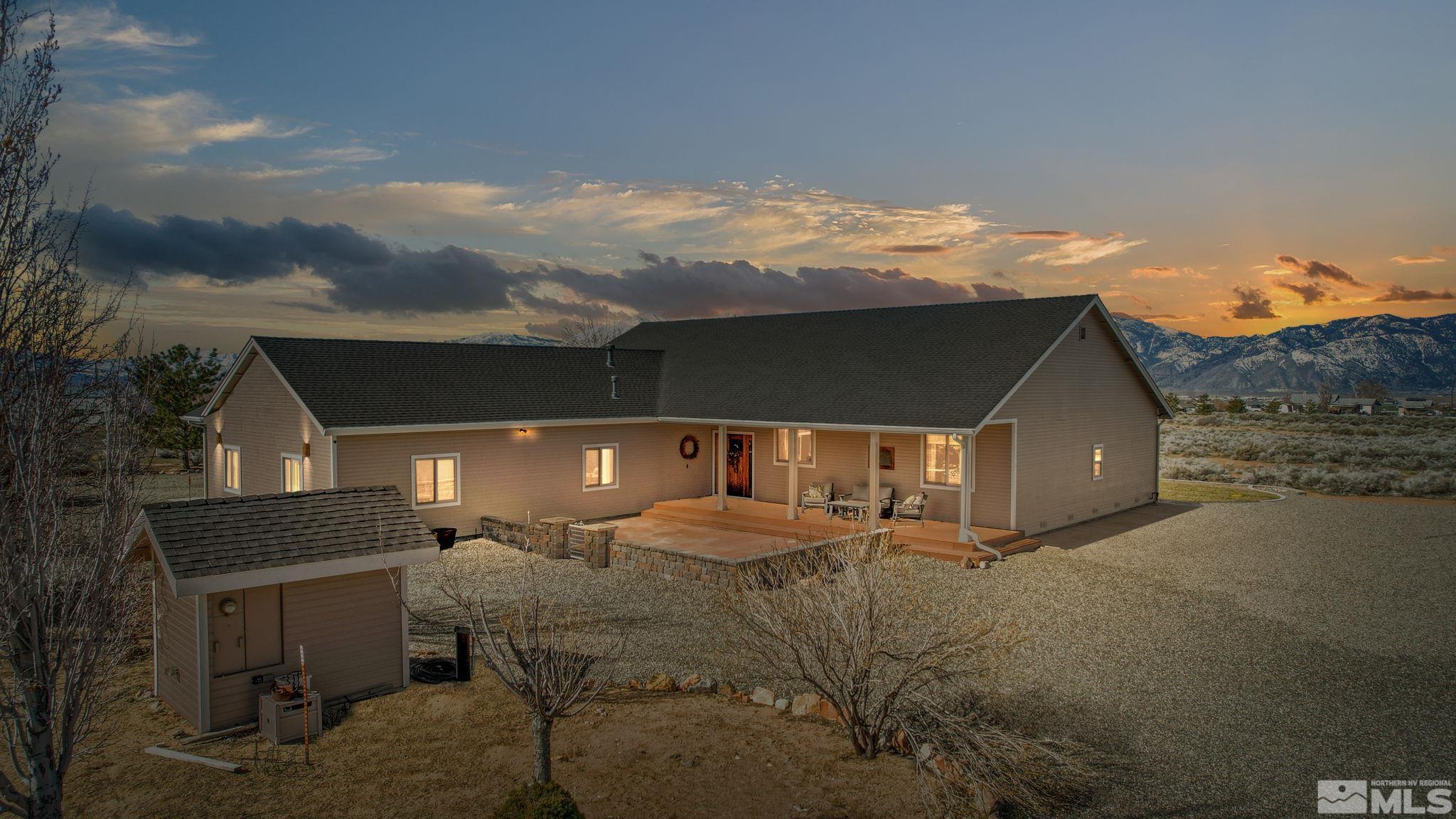 2428 Hasbita Lane Minden, NV 89423 - Photo 1 of 33 a front view of house with yard and car parked