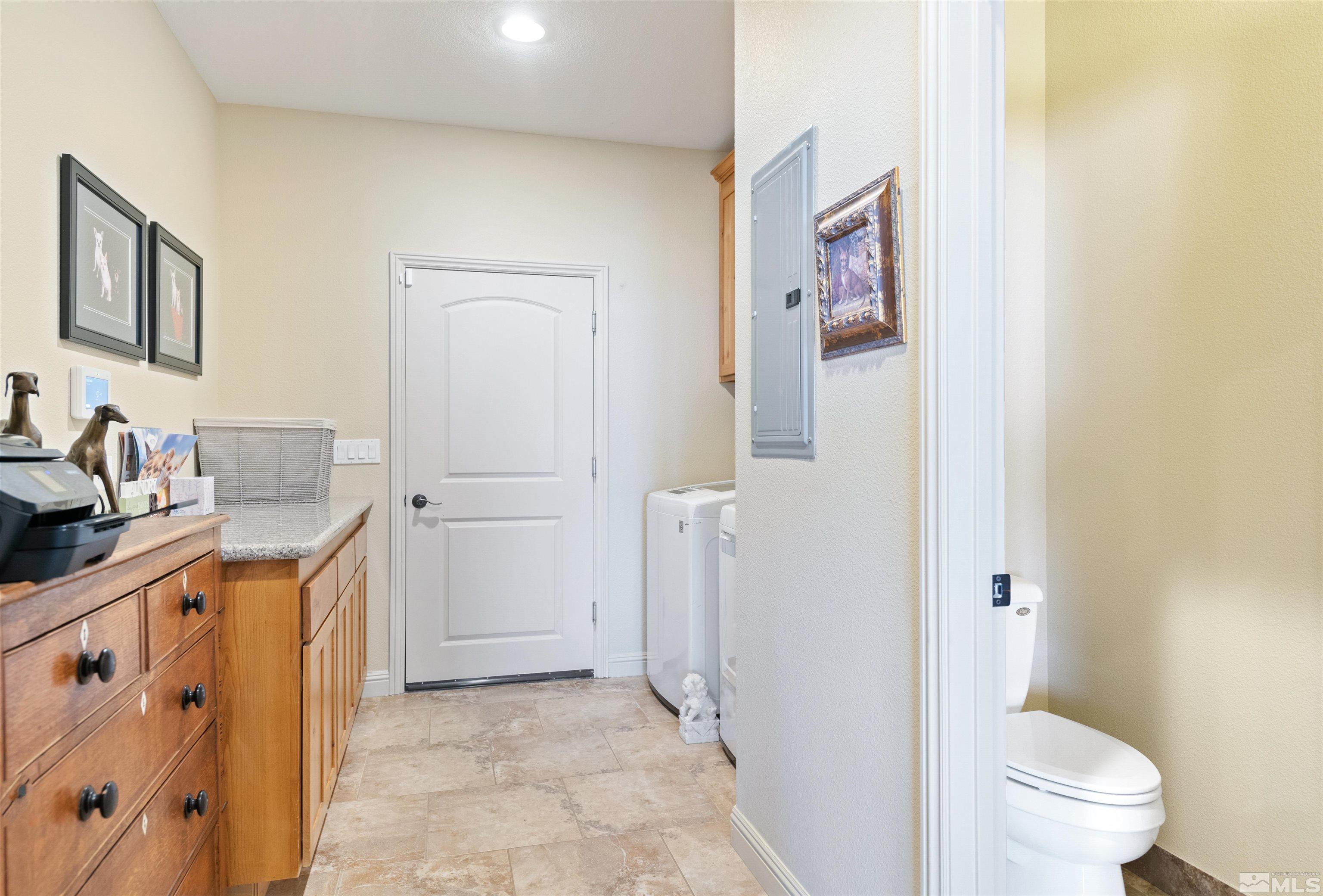 2428 Hasbita Lane Minden, NV 89423 - Photo 21 of 33 a bathroom with a sink a toilet and shower