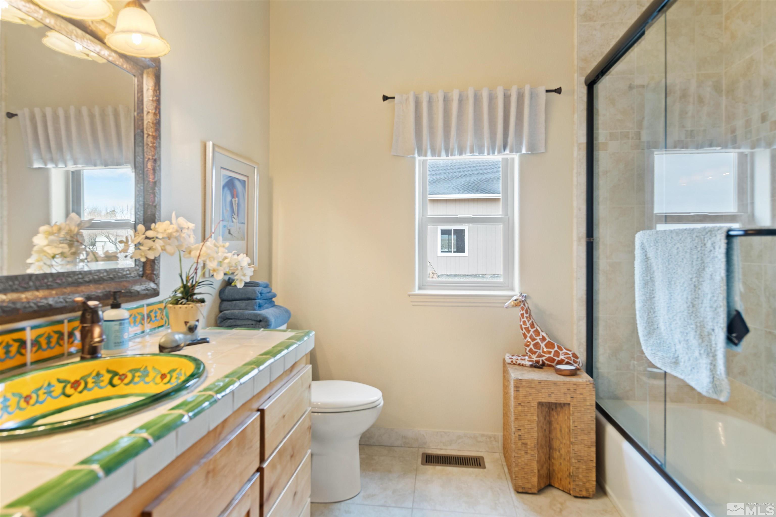 2428 Hasbita Lane Minden, NV 89423 - Photo 23 of 33 a bathroom with a sink toilet and shower
