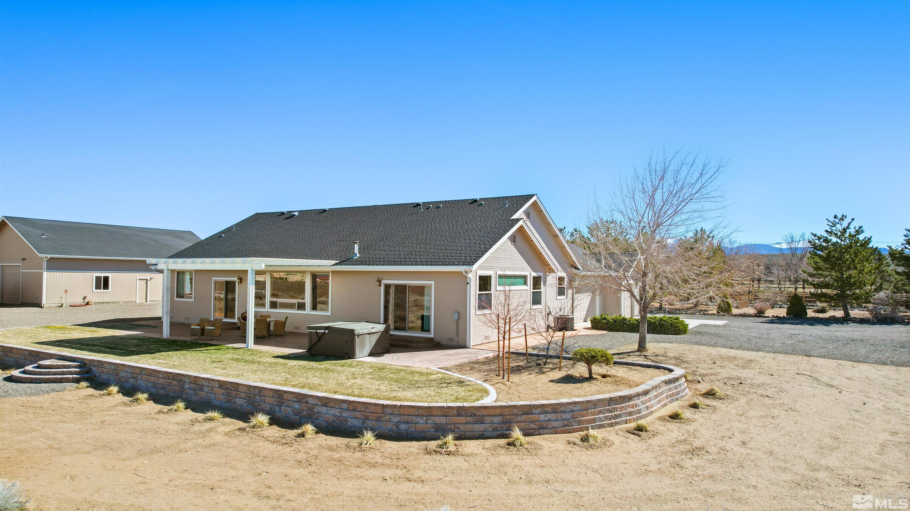 2428 Hasbita Lane Minden, NV 89423 - Photo 26 of 33 a front view of a house with a yard