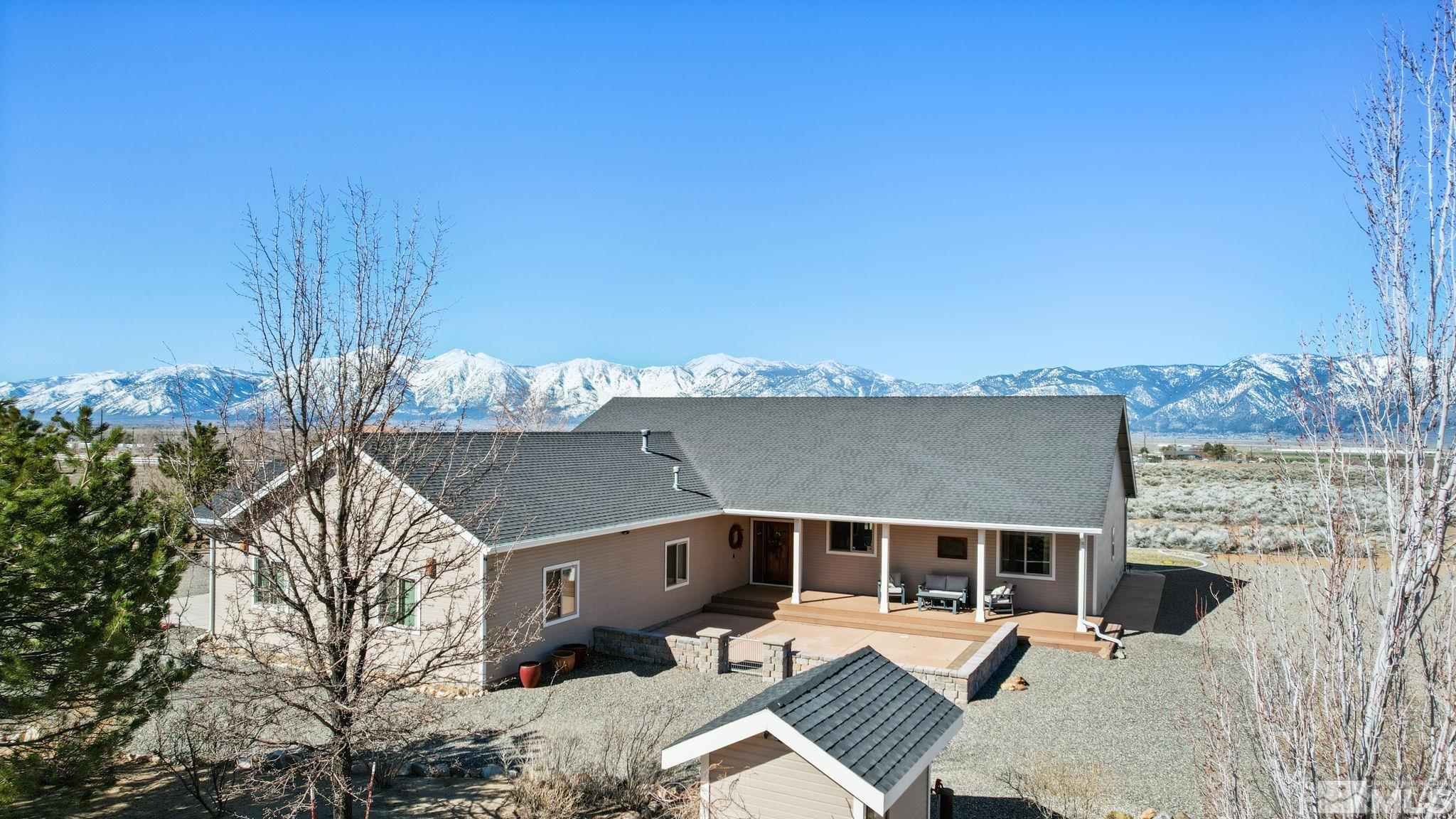2428 Hasbita Lane Minden, NV 89423 - Photo 3 of 33 a front view of a house with a yard