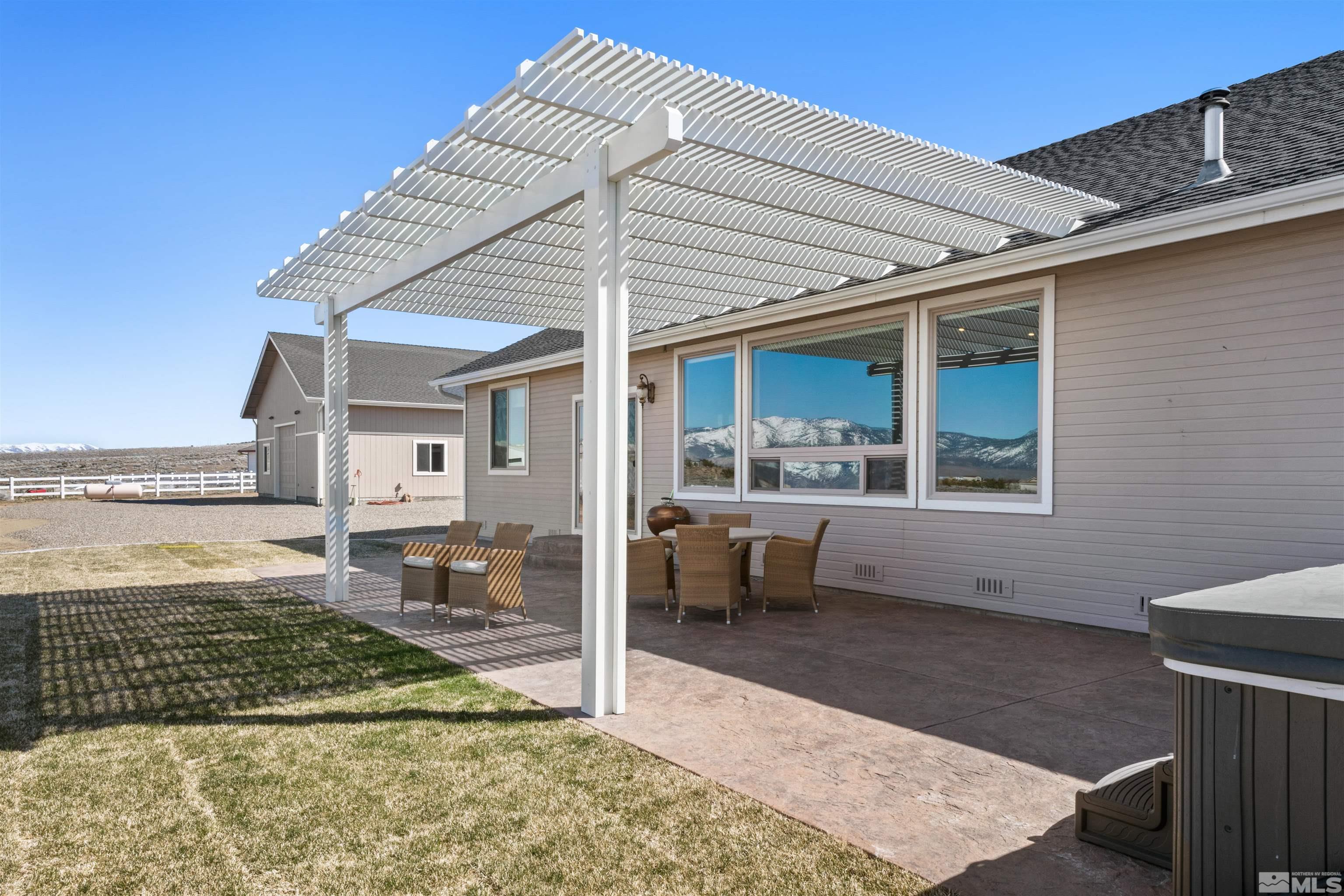 2428 Hasbita Lane Minden, NV 89423 - Photo 32 of 33 a view of a dinning table and chair in the patio