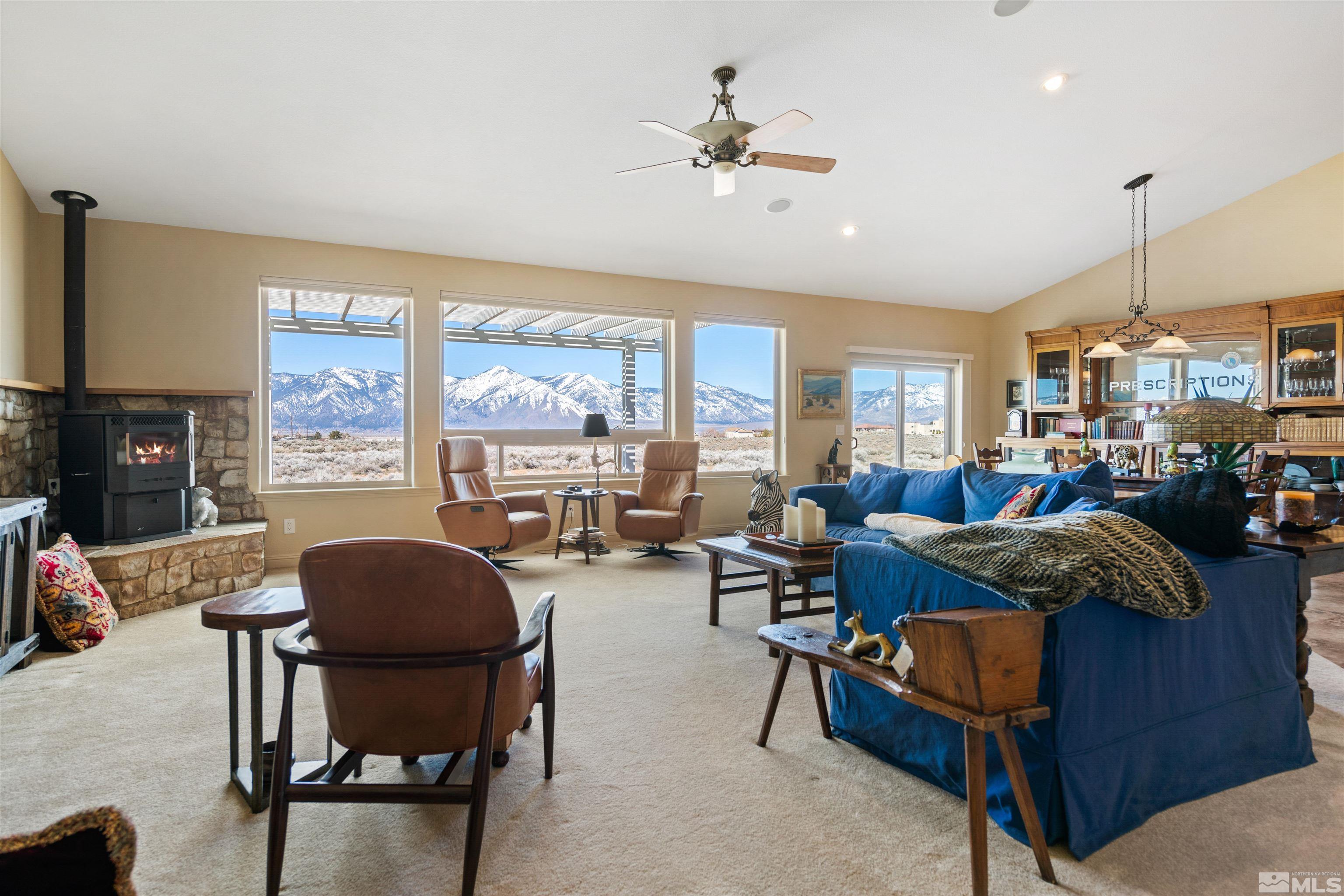 2428 Hasbita Lane Minden, NV 89423 - Photo 8 of 33 a living room with furniture and a large window