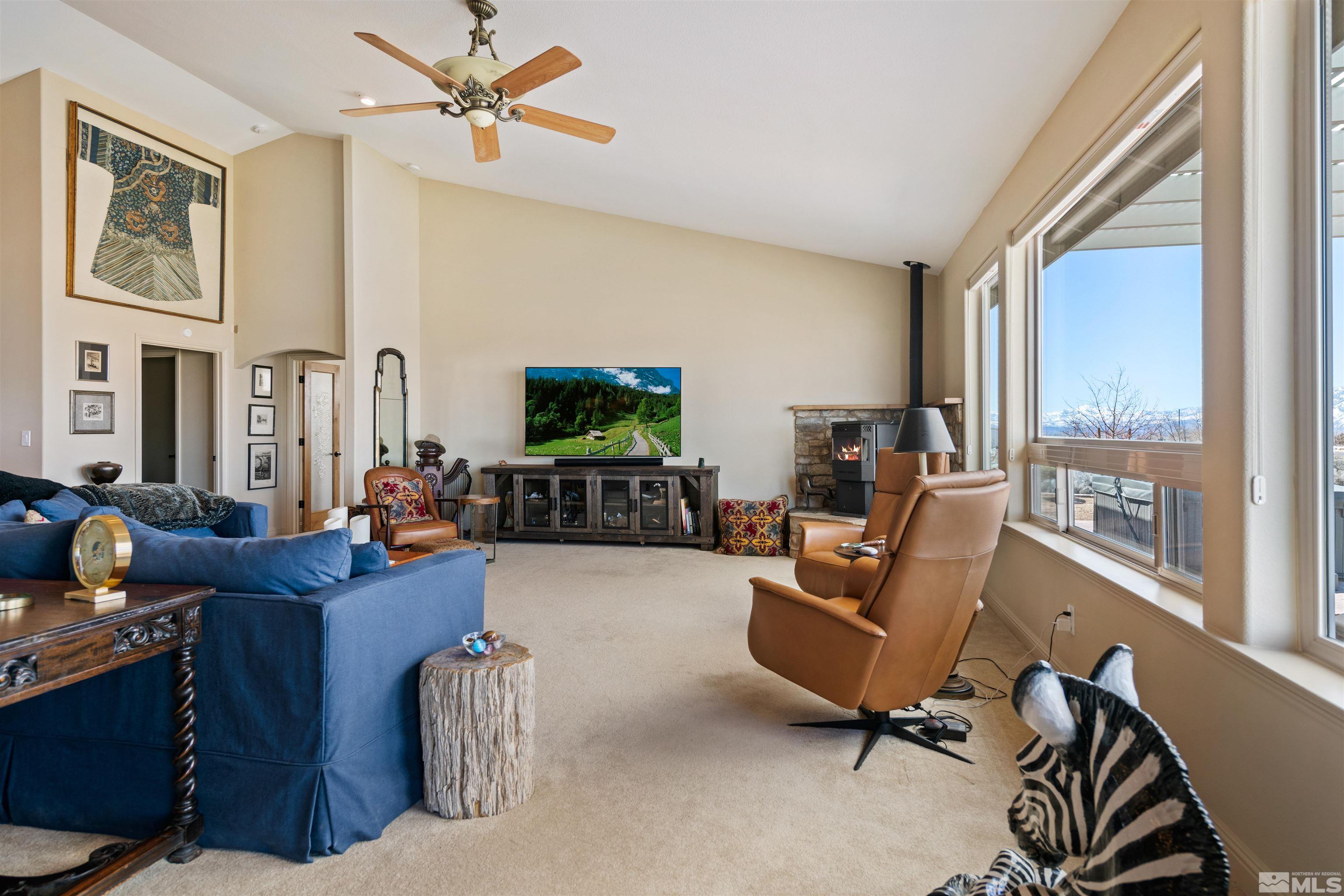 2428 Hasbita Lane Minden, NV 89423 - Photo 10 of 33 a living room with furniture and a flat screen tv