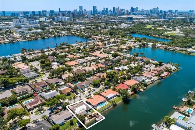 a kitchen with sink and cabinets
