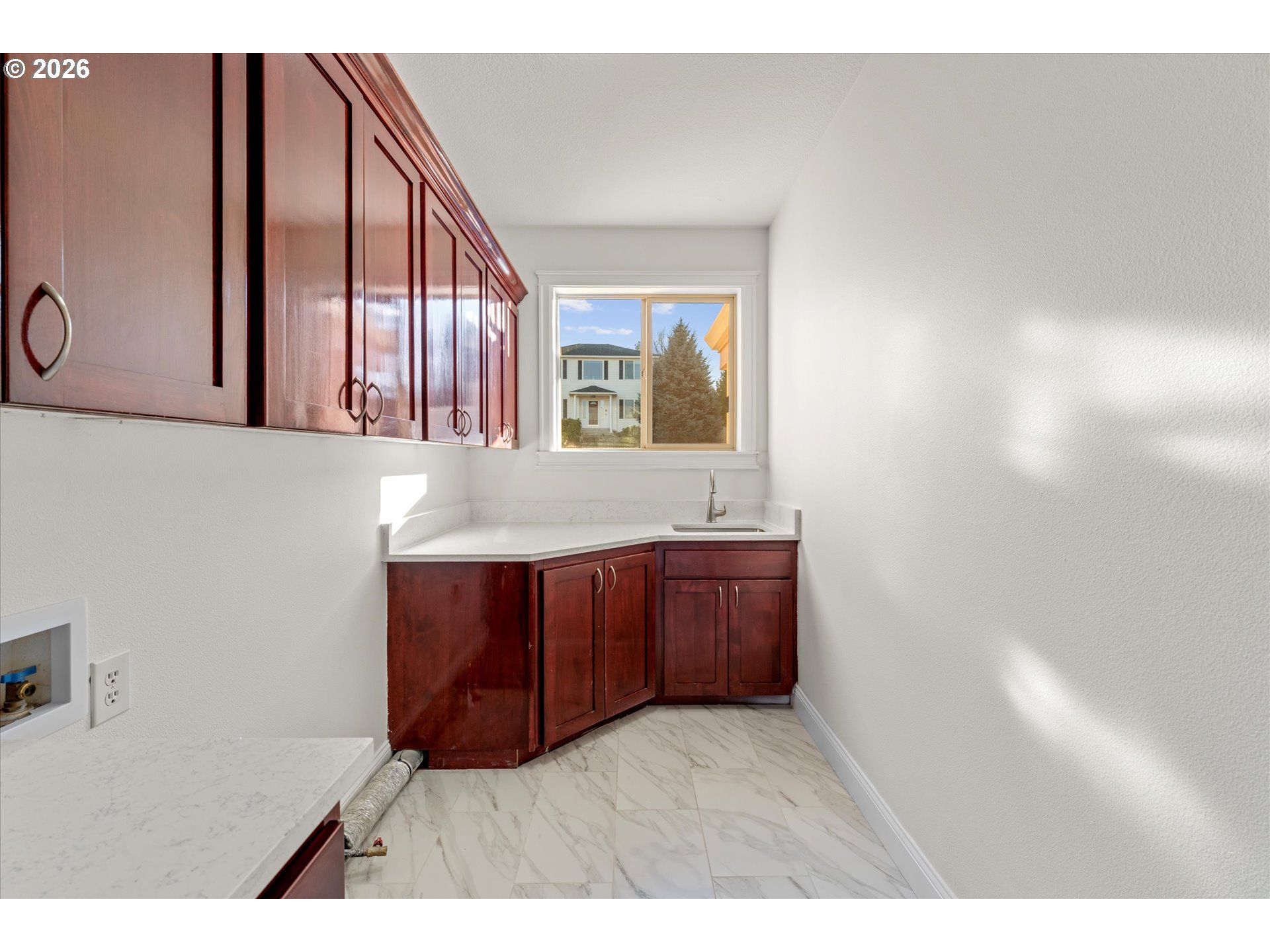 1727 Northwest Ogden Street Camas, WA 98607 - Photo 19 of 48 a view of hallway with granite countertop a couch and a large window
