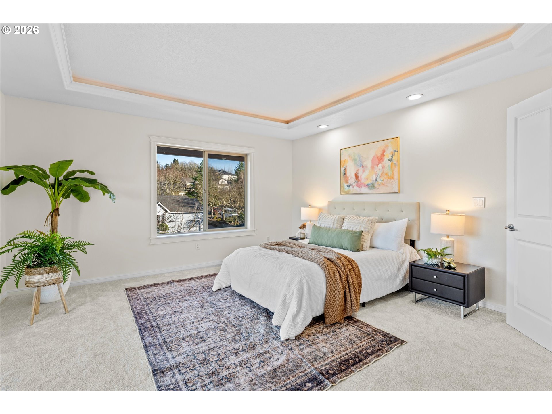 1727 Northwest Ogden Street Camas, WA 98607 - Photo 20 of 48 a spacious bedroom with a large bed and a potted plant